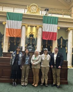 Grassroots advocates join Rhode Island Senate President Valarie Lawson, center, after testifying in support of legislation to establish a rare disease advisory council (RDAC) in the state.